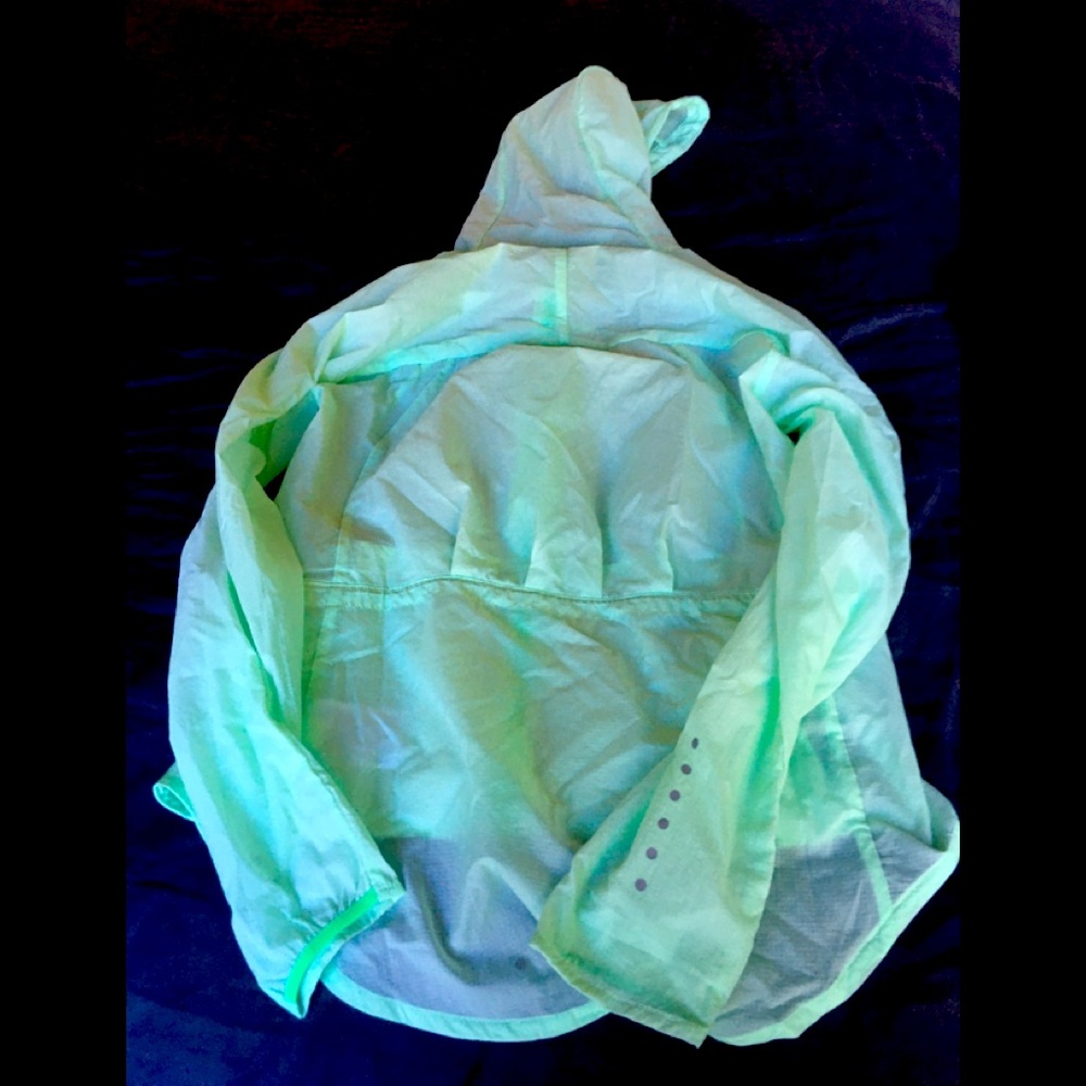 Neon green Nike windbreaker running jacket